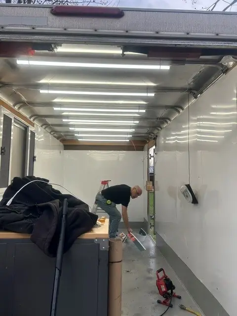 Early build — framing, lights and walls